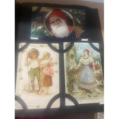 247 - Misc. coln. in 2 old albums. Better greetings with Father Christmas noted, embossed type etc. Childr... 