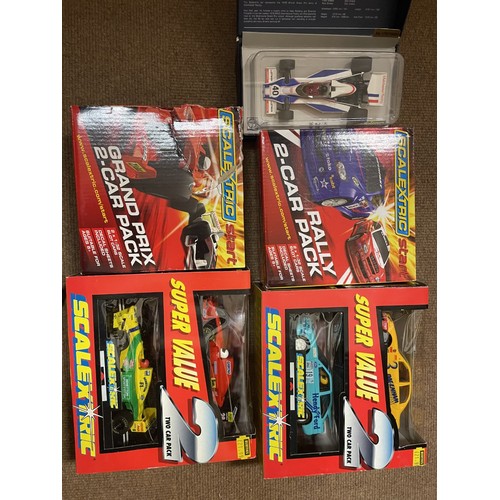 368 - Scalextric. Boxed collection with rally car twin pack No C3139, endurance twin pack No C3140, Ferrar... 