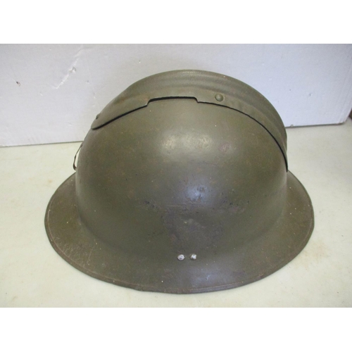 108 - Helmet range with British Brodie with Belgian decal, liner dated 1950, Belgian M26 Adrian, lion's he... 