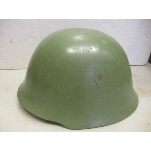 111 - Helmet range all fitted with liners with British WW2 era Brodie with net cover, WW2 Air Raid warden,... 