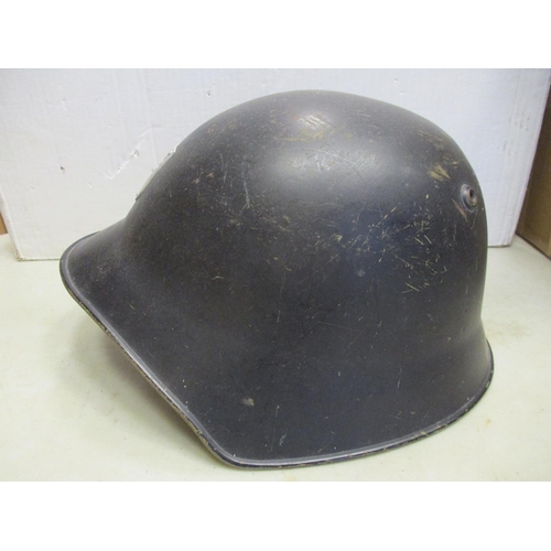 111 - Helmet range all fitted with liners with British WW2 era Brodie with net cover, WW2 Air Raid warden,... 