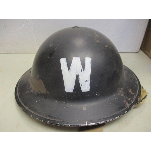 111 - Helmet range all fitted with liners with British WW2 era Brodie with net cover, WW2 Air Raid warden,... 