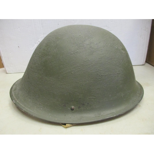 111 - Helmet range all fitted with liners with British WW2 era Brodie with net cover, WW2 Air Raid warden,... 