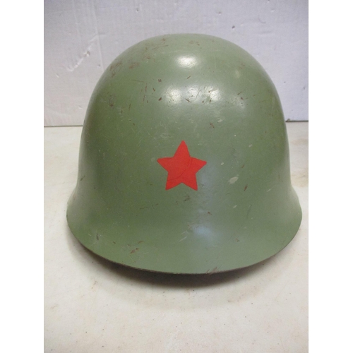 111 - Helmet range all fitted with liners with British WW2 era Brodie with net cover, WW2 Air Raid warden,... 