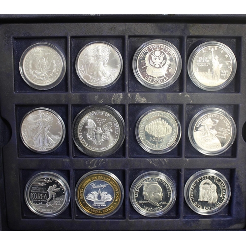 633 - USA. Collection of mainly USA commemorative and circulated silver dollars, with 1893 ½ dollar, 1928 ... 