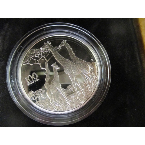 635 - Zambia. 1998 100 Kwacha Wildlife cased set of 12 silver proofs FDC, odd with toning, in plush box by... 