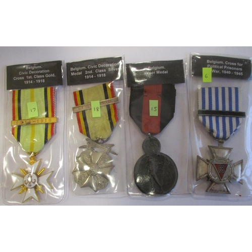 65 - Belgium. Collection including Croix de Guerre with palme, Order of Leopold Officer with crossed swor... 