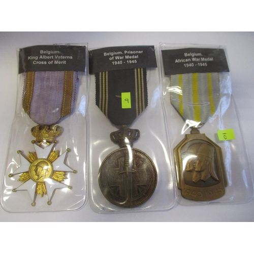 65 - Belgium. Collection including Croix de Guerre with palme, Order of Leopold Officer with crossed swor... 