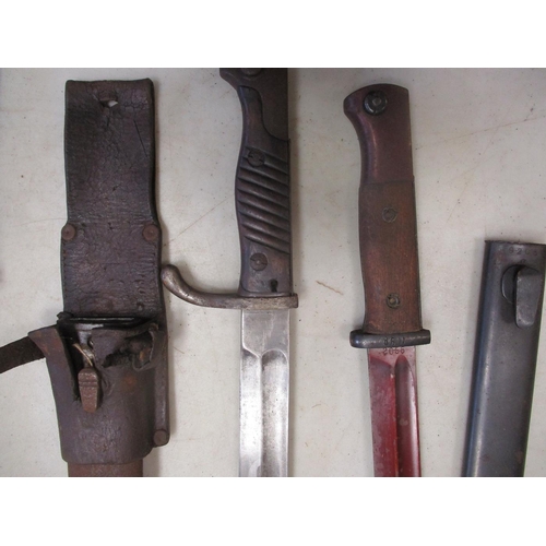 81A - German bayonet and scabbard range with:
1. K98 by Rich A. Herder, 2055, mis-matched scabbard No 9203... 