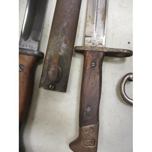 84 - German bayonet and scabbard range with:
1. K98 by Berg & Co No 8548/C.
2. M1898/05 by Weyersberg Kir... 