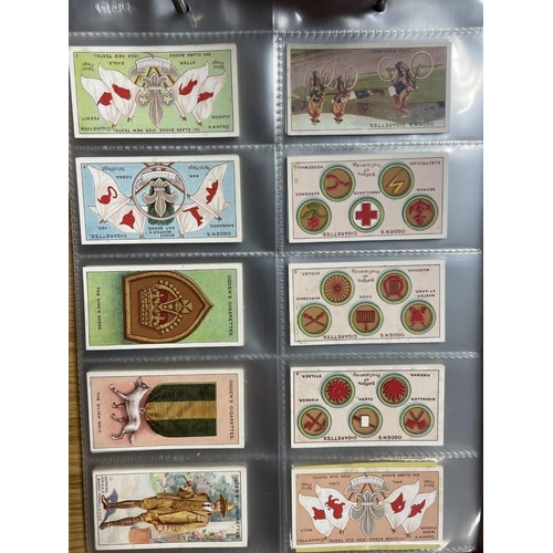 106A - Ogdens. Collection in album with complete sets including Boy Scouts blue/ black, third series, fifth... 