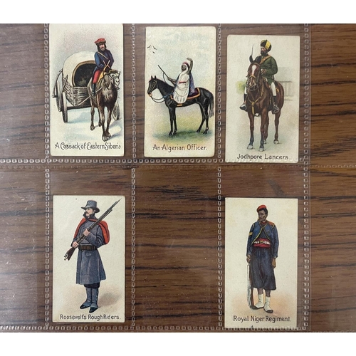 110A - Roberts and Sons. A range of 1900 onwards military themed cards with part set of (30) and part set o... 