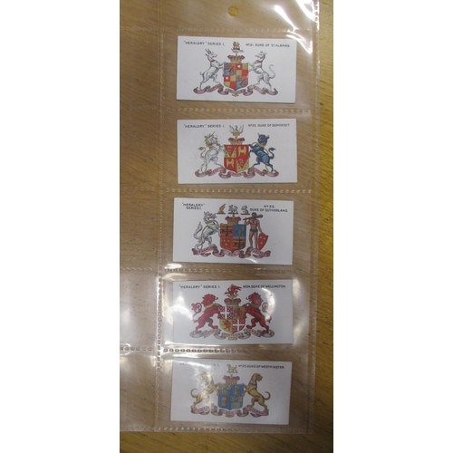 114A - Taddy. 1913 Heraldry Series full set, generally good with few tone spots but overall an attractive s... 