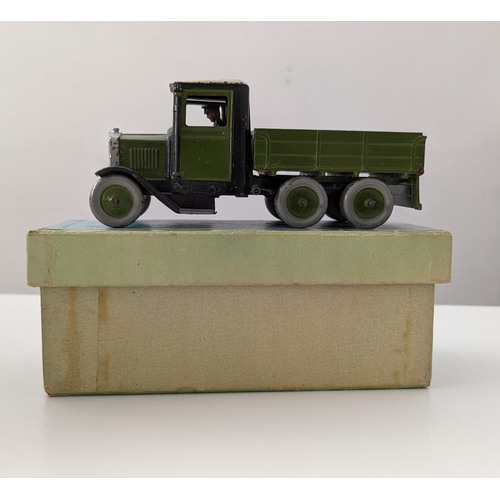 299 - Britains. Model Home Farm Four Wheeled Lorry No. 59F (1934 version), green/ black body, cream roof, ... 