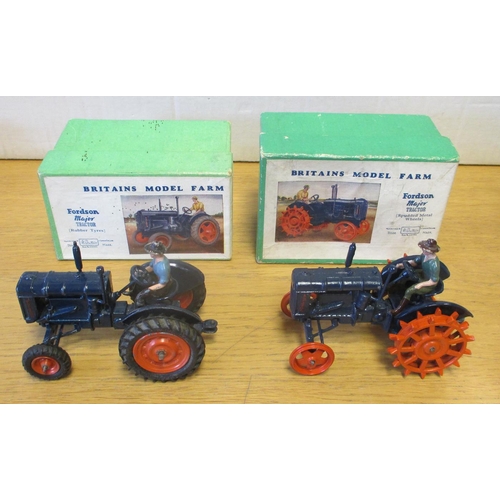 300 - Britains. Model Farm series Fordson Major Tractor pair, blue body, orange spud wheels, with figure d... 