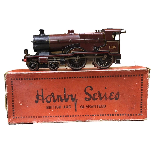 523 - Hornby. O gauge No. 2 Special Class 4-4-0 LMS 1185 maroon clockwork (with key) locomotive and tender... 