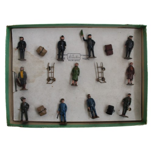 296 - Britains. Railways Station Staff Set No. 1256, with figures (11), luggage (4), trolleys (2), good pl... 