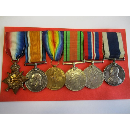 53 - Family group with
1. 1914-15 Star trio, WW2 Defence Medal, BWM and KGV Royal Navy LSGC to J.6980 P. ... 