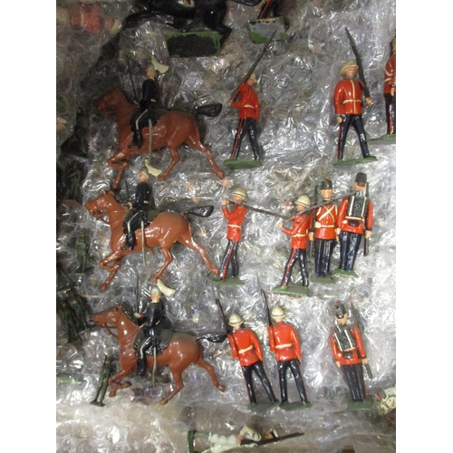 188 - Large unboxed collection of metal and plastic figures in 3 boxes, range of makers including Britains... 