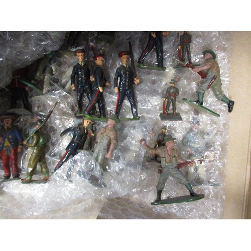 188 - Large unboxed collection of metal and plastic figures in 3 boxes, range of makers including Britains... 