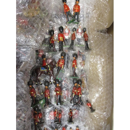 188 - Large unboxed collection of metal and plastic figures in 3 boxes, range of makers including Britains... 