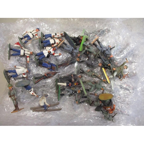 189 - Large unboxed collection of metal and plastic figures in 2 boxes, range of makers including Britains... 