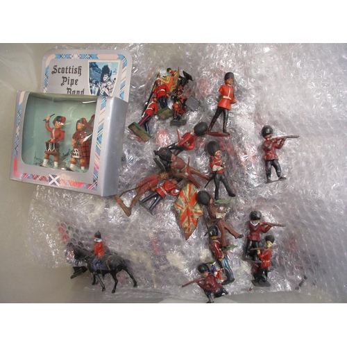 189 - Large unboxed collection of metal and plastic figures in 2 boxes, range of makers including Britains... 