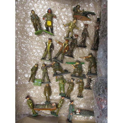 194 - Large unboxed collection of metal and plastic figures in 2 boxes, range of makers including Britains... 