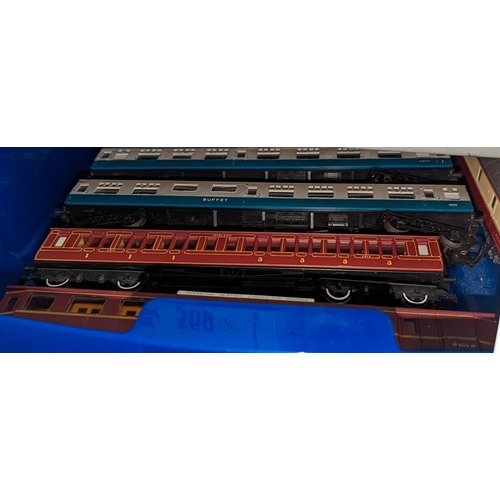 303 - Collection of OO Gauge railway, including locomotives, coaches, wagons and track in 38 plastic boxes... 