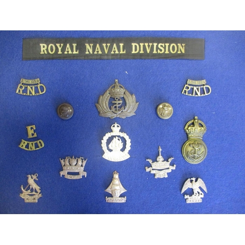 115 - Royal Navy Division mainly badge collection mounted on 4 boards including silk postcard, sweetheart ... 