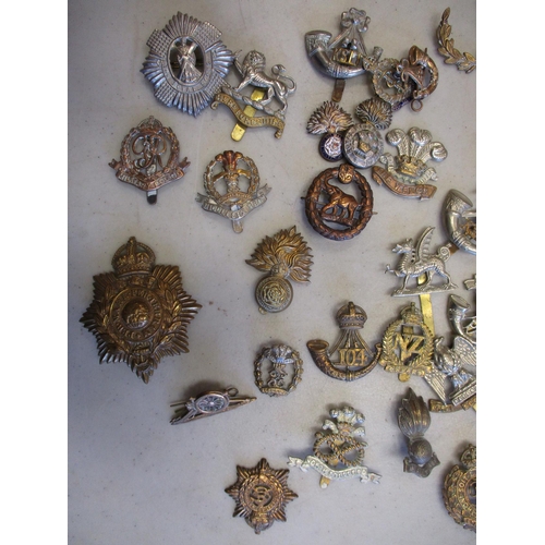 118 - Mixed collection, mainly metal cap badges, shoulder titles, sweetheart badges, trade badge, odd Germ... 