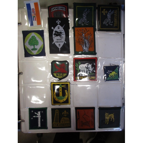 145 - Scout collection of cloth badges in 4 albums with wide range of counties, towns, cities etc, mainly ... 