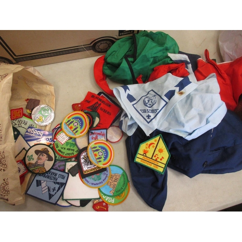 147 - Scout collection including large blanket poncho with wide range of badges, pennants and belt sewn on... 