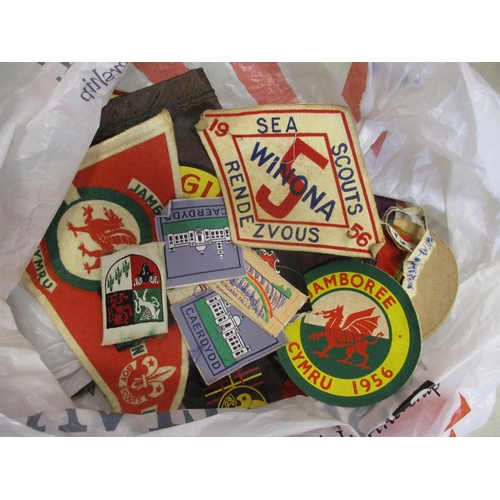 147 - Scout collection including large blanket poncho with wide range of badges, pennants and belt sewn on... 