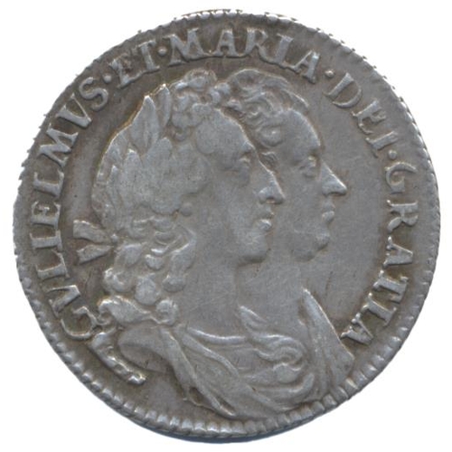 312 - 1693 sixpence nearly very fine. (See photo) (Y)