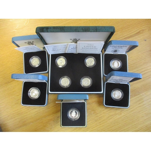 649 - Range of boxed silver proofs FDC, with £2 1989 twin set (3), £1 piedfort 1987, 1998, 2002 (2), 2003,... 