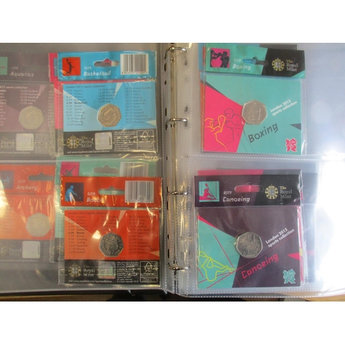 679 - 2012 Olympics uncirculated 50p set of 29, plus completer medallion, on Royal Mint cards. Qty 30 (V)