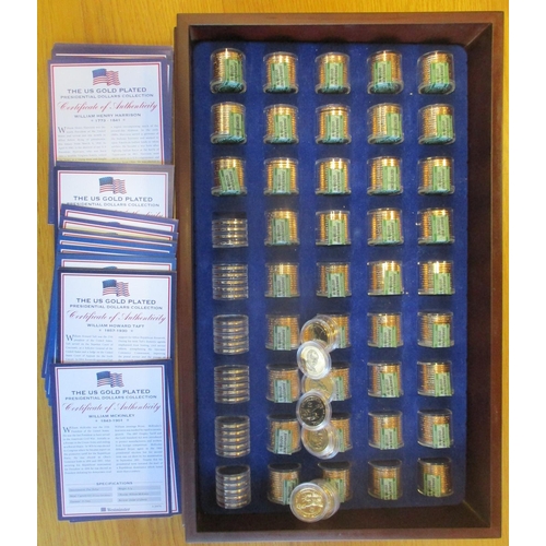 738 - USA. Presidential Dollars collection of gold plated $1 in wooden presentation case, with Washington ... 