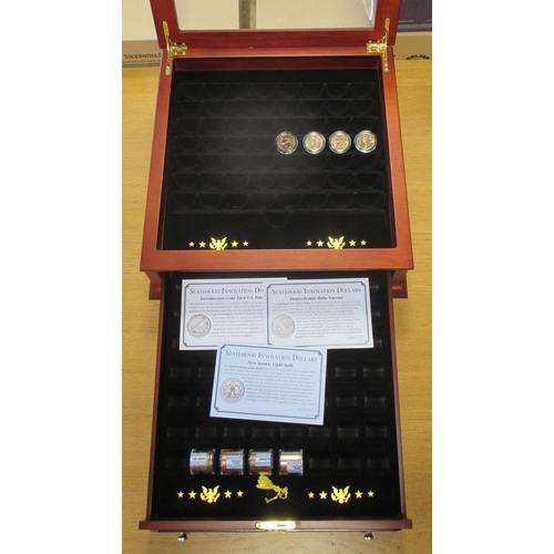 739 - USA. Collection in 4 wooden presentation cases with Historic Silver Dollars range by Danbury Mint wi... 