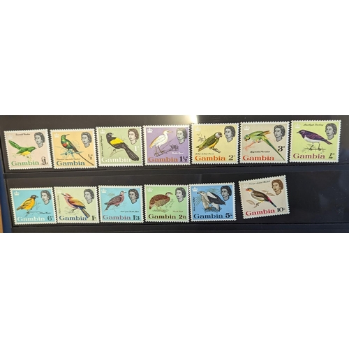 132 - Gambia. Early to Mid coln in s/pages incl 1922 set of 19 M, 1938 set of 16 UM, 1963 set of 13 UM. To... 