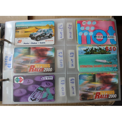 174 - Misc. collectables. Accum. of worldwide phone cards in 5 plastic tubs filed in albums covering a div... 