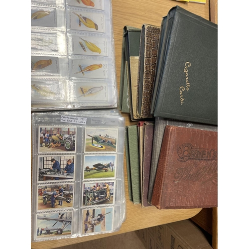 22 - Collection in plastic sleeves and stock books including sets with Players RAF Badges, Coronation ser... 