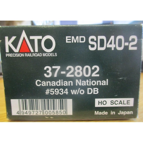 445 - Kato. Range of OO gauge locomotives, generally mint in near mint boxes, with 37-015, 37-045, 37-046,... 