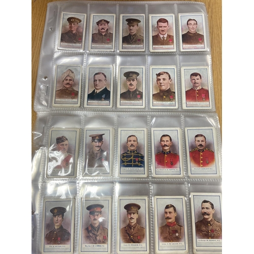 55 - Gallaher. Collection in plastic sleeves including complete sets with V.C. Heroes sets 1-8 generally ... 