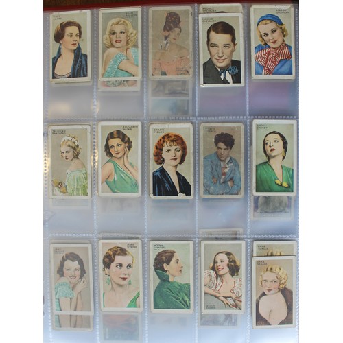 25 - Collection in albums and frames with sets including Wills Household Hints, Flowering Trees and Shrub... 