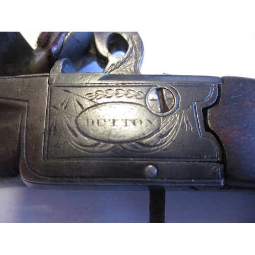 106 - Boxlock flintlock pistol by Dutton of London, screw off barrel, drop down trigger, overall length 15... 