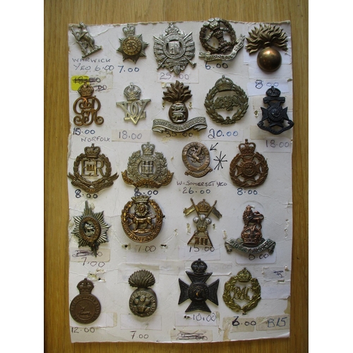 135 - Collection of metal mainly cap badges, QV onwards mounted on cards, wide range of regiments includin... 