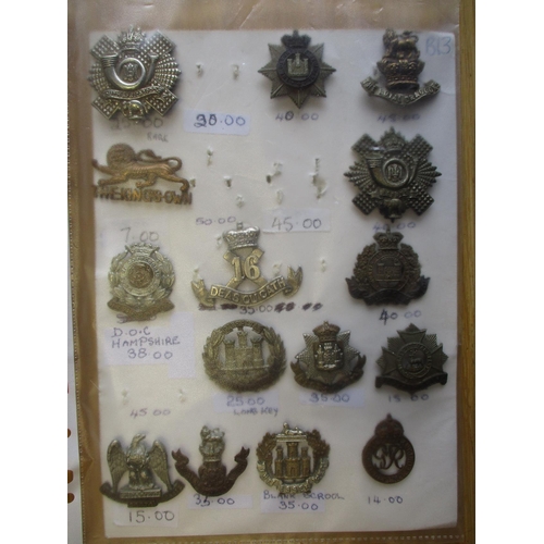 135 - Collection of metal mainly cap badges, QV onwards mounted on cards, wide range of regiments includin... 