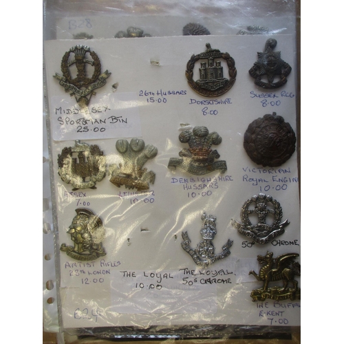 141 - Collection of mainly metal cap and glengarry badges mounted on 5 cards, wide range of regiments incl... 