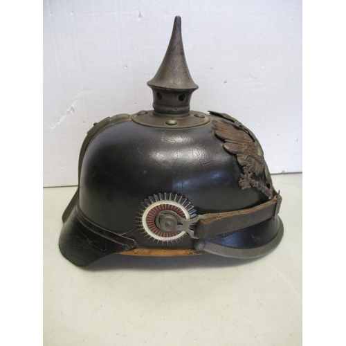 143 - 1916 Prussian Enlisted Man's pickelhaube, black leather skull and peaks, Prussian helmet plate, rose... 